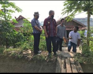 Tanggul Jebol,Wakil Walikota Turun Meninjau